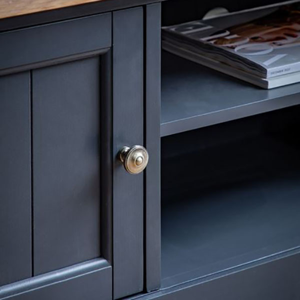 Gallery Direct Eton Contemporary Meteor Painted / Oak Media Unit - Close up image of the Meteor dark blue painted finish & metal cupboard door
