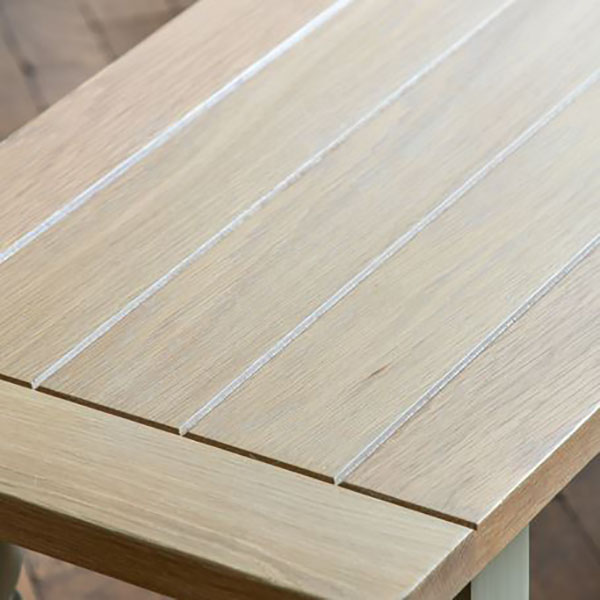 Gallery Direct Eton Contemporary Prairie Painted / Oak Dining Bench - Close up image of the grooved planked top of the bench