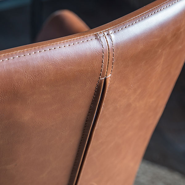 Close up  image showing the back of the Harvest Direct Edison Brown Swivel Chair