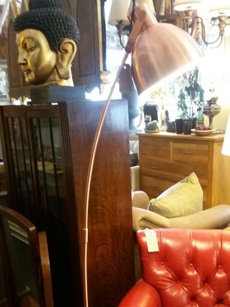 Edison Vintage Lghting ultra contemporary shiny copper floor standing lamp on display in our Southport furniture showrooms