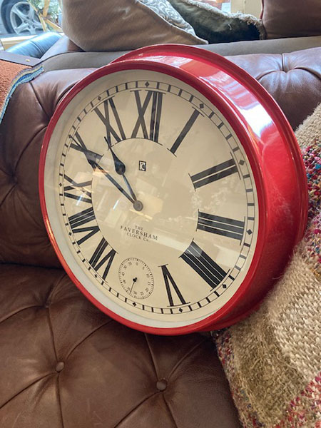 Harvest Direct Concord Red Wall Clock on display in our Southport showrooms showing the depth of the clock as well as the clock face