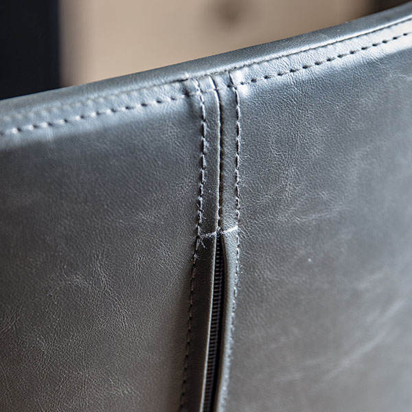 Gallery Direct Mendel Charcoal Swivel Chair - Close up image of part of the back of the chair