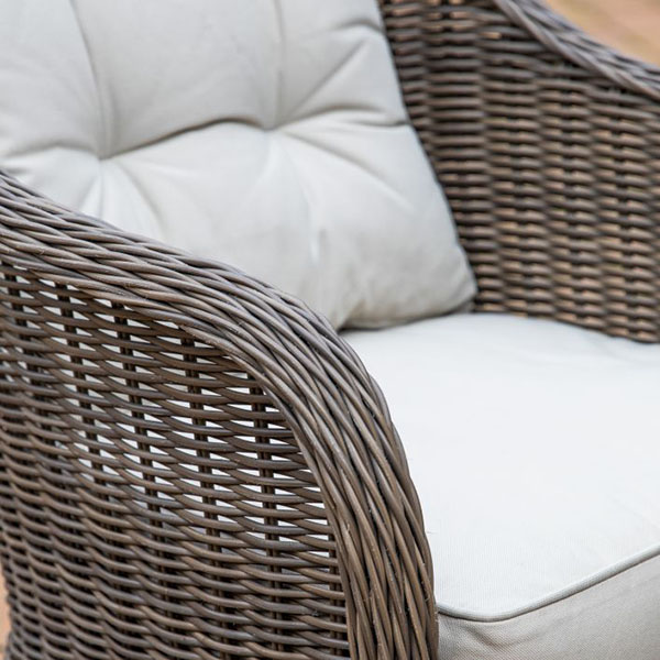 Harvest Direct Fior Natural 4 Seater Outdoor Round Dining Set - Close up image of a dining chair frame & cushion
