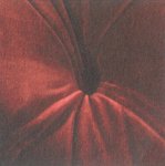 Close up image of the buttoned velvet detail on the Tetrad Coniston sofa
