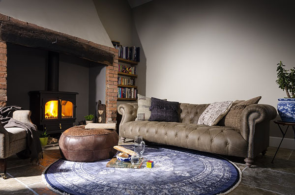 Tetrad Cotton Printed Round Indigo Rug & Mattisse Grand Leather Sofa